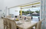 Dining Table with Pool Area Views